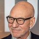 Sir Patrick Stewart poses on the red carpet